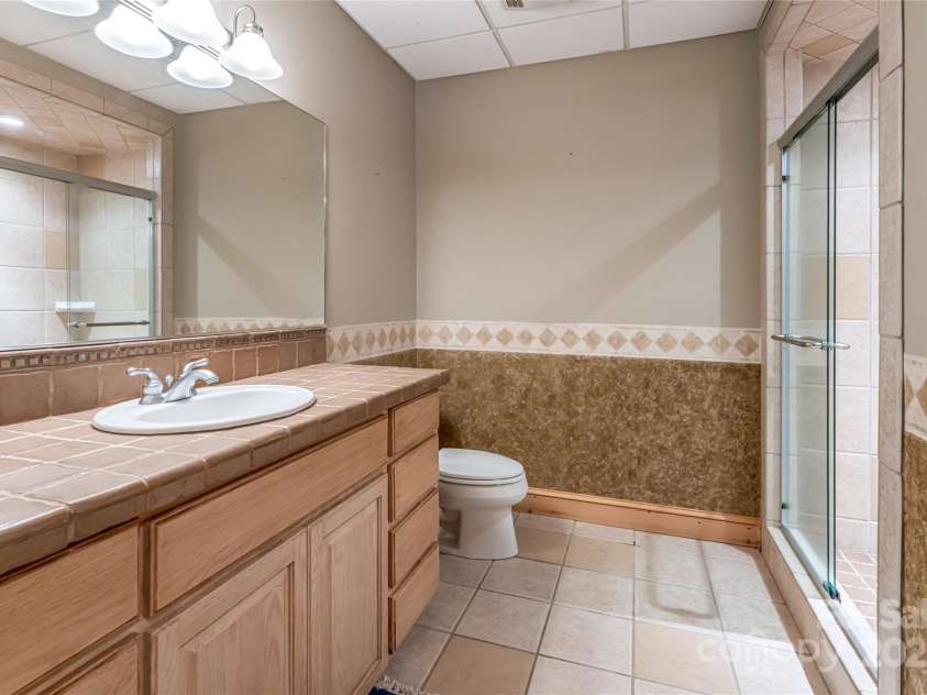 303 Flying Hawk Trail, Waynesville, NC 28786.  MLS# CAR4272138, YatesRealty ID 86. Full bath #3