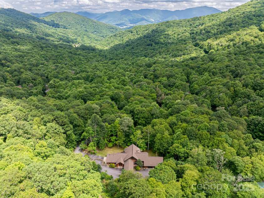 303 Flying Hawk Trail, Waynesville, NC 28786.  MLS# CAR4272138, YatesRealty ID 86. Seemingly worlds away but only 10 minutes to historic downtown Waynesville