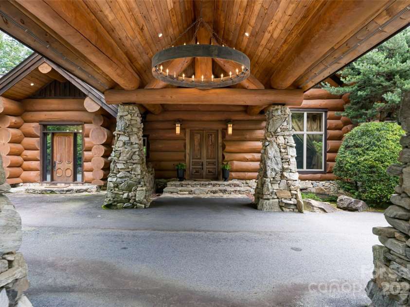 303 Flying Hawk Trail, Waynesville, NC 28786.  MLS# CAR4272138, YatesRealty ID 86. This may be the most stunning porte-cochere this side of the Mississippi