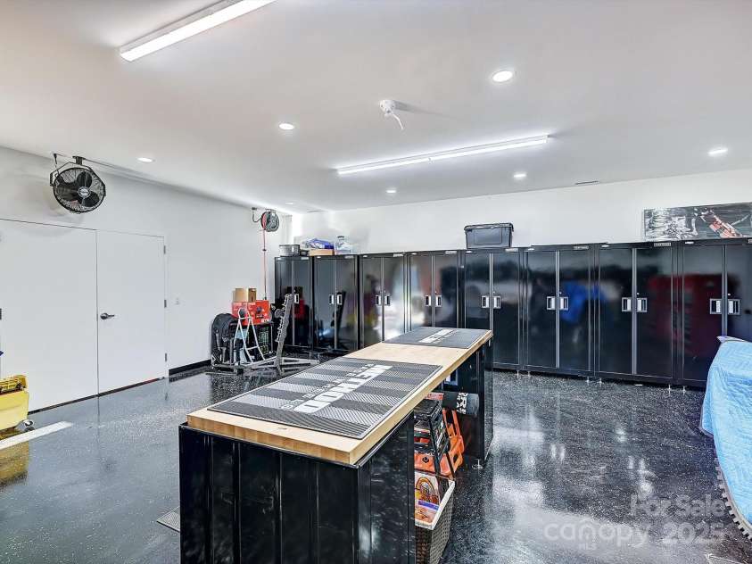 1525 Shinnville Road, Cleveland, NC 27013.  MLS# CAR4249385, YatesRealty ID 860. Lower Level Conditioned Workshop