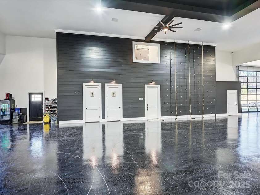 1525 Shinnville Road, Cleveland, NC 27013.  MLS# CAR4249385, YatesRealty ID 860. Showcase Garage featuring rock climbing wall