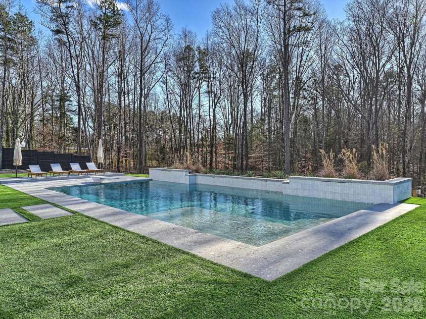 1525 Shinnville Road, Cleveland, NC 27013.  MLS# CAR4376397, YatesRealty ID 860. Backyard featuring saltwater pool and turf