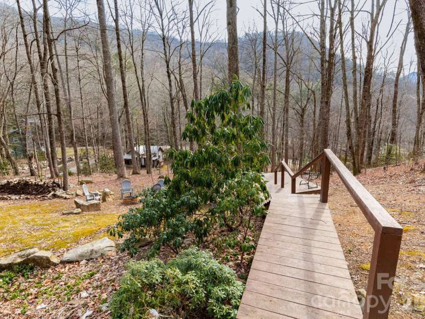 71 Honeymoon Lane, Maggie Valley, NC 28751.  MLS# CAR4342121, YatesRealty ID 8601. Front Yard - stairs to lower level deck