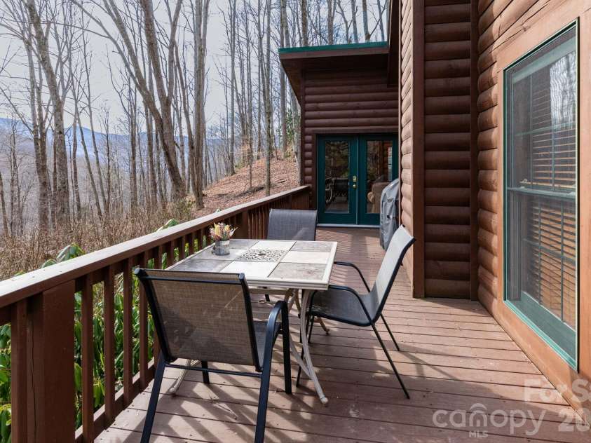 71 Honeymoon Lane, Maggie Valley, NC 28751.  MLS# CAR4342121, YatesRealty ID 8601. Wraparound Deck with Views