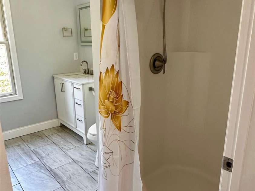 11 Martel Lane, Asheville, NC 28804.  MLS# CAR4304470, YatesRealty ID 8611. Shower in Guest Bathroom