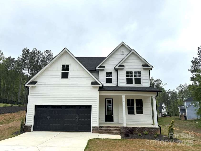 157 Powder Spring Drive, Statesville, NC 28677.  MLS# CAR4222061, YatesRealty ID 8611. Front Exterior
