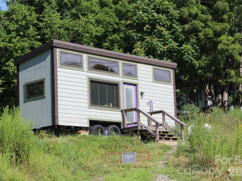 437 Onteora Boulevard, Asheville, NC 28803.  MLS# CAR4361742, YatesRealty ID 8612. A warm welcome to the tiny house!