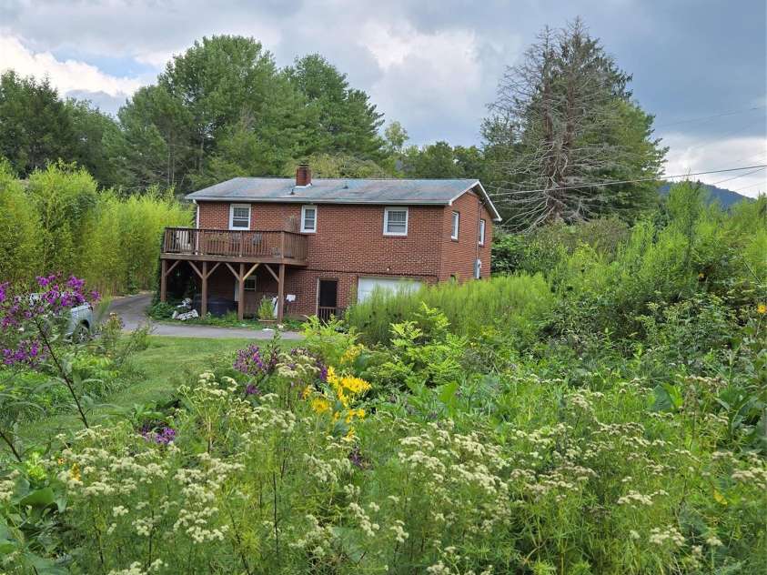 437 Onteora Boulevard, Asheville, NC 28803.  MLS# CAR4361742, YatesRealty ID 8612. Bountiful gardens