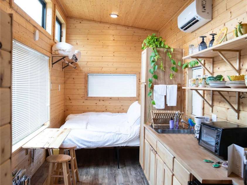 437 Onteora Boulevard, Asheville, NC 28803.  MLS# CAR4361742, YatesRealty ID 8612. Comfy and cozy tiny house offerings