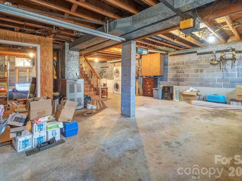 437 Onteora Boulevard, Asheville, NC 28803.  MLS# CAR4361742, YatesRealty ID 8612. Large unfinished basement
