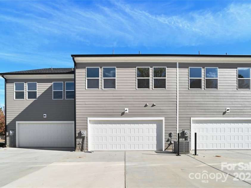 143 Carriage Club Drive, Mooresville, NC 28117.  MLS# CAR4222115, YatesRealty ID 8614. Exterior Rear