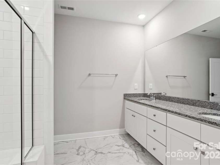 143 Carriage Club Drive, Mooresville, NC 28117.  MLS# CAR4222115, YatesRealty ID 8614. Primary Bathroom