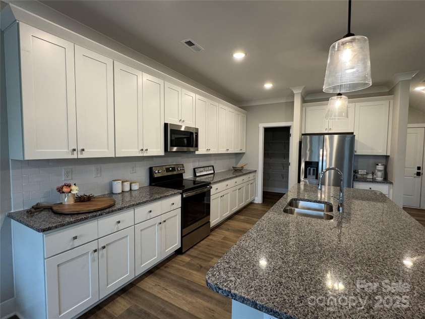 143 Carriage Club Drive, Mooresville, NC 28117.  MLS# CAR4222115, YatesRealty ID 8614. Staged Kitchen