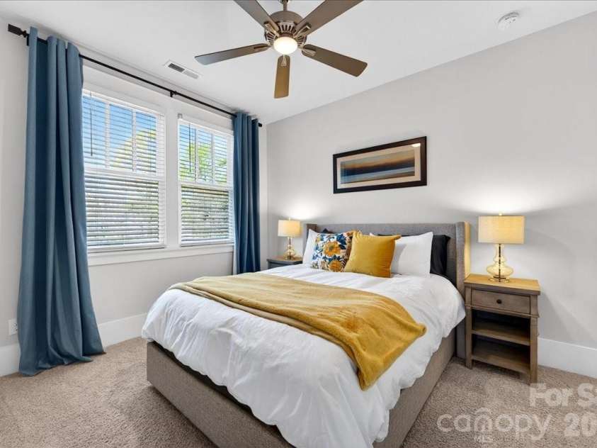 508 Beaty Street, Davidson, NC 28036.  MLS# CAR4344372, YatesRealty ID 8614. Bedroom #2 on the second level with large windows