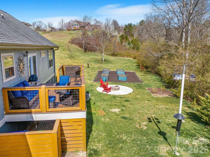 223 Reilly Drive, Leicester, NC 28748.  MLS# CAR4353690, YatesRealty ID 8619. Back deck with composite decking.