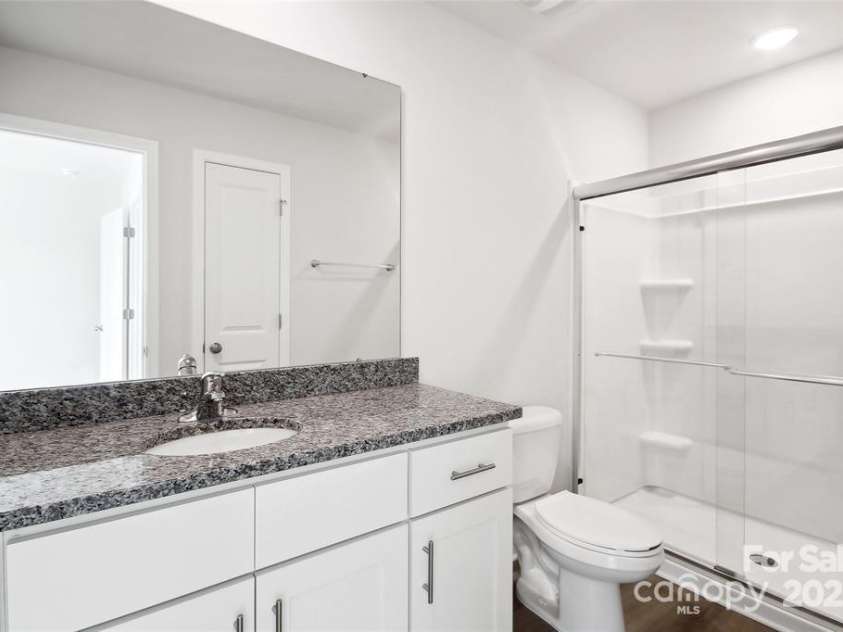 225 Kennerly Avenue, Mooresville, NC 28115.  MLS# CAR4222778, YatesRealty ID 8620. Primary Bathroom