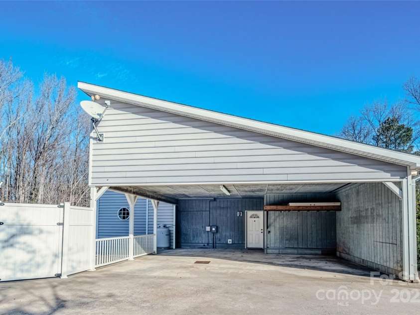 1215 Juniper Street, Salisbury, NC 28146.  MLS# CAR4329687, YatesRealty ID 8623. 2-Car Carport