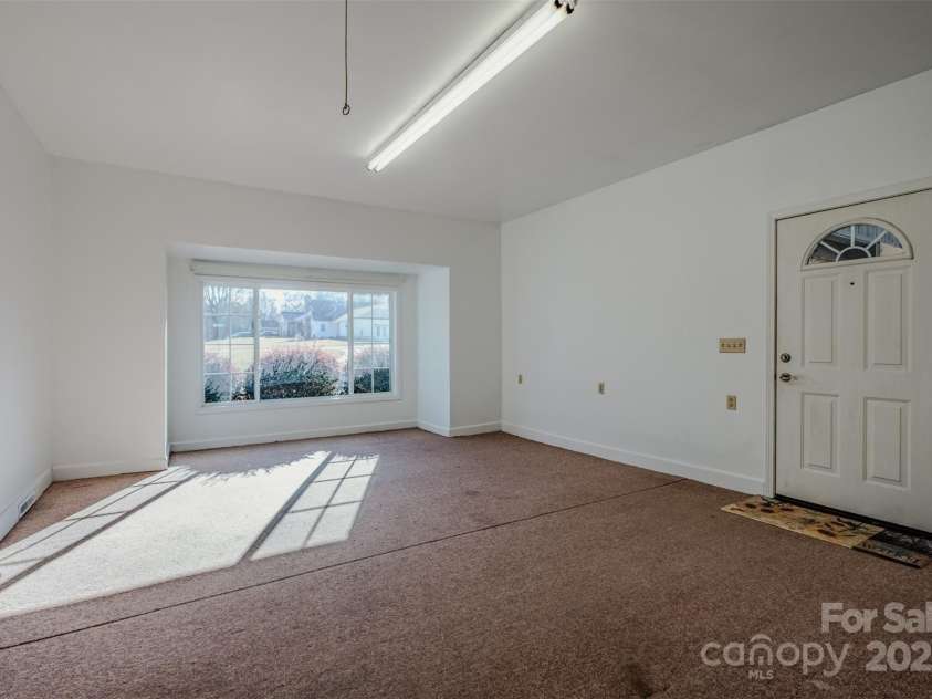 1215 Juniper Street, Salisbury, NC 28146.  MLS# CAR4329687, YatesRealty ID 8623. Office/Flex Space on Main Level