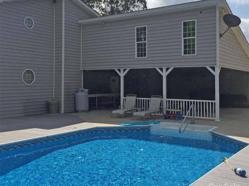 1215 Juniper Street, Salisbury, NC 28146.  MLS# CAR4329687, YatesRealty ID 8623. Pool and Carport