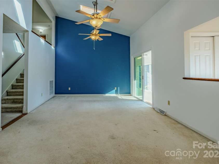 1215 Juniper Street, Salisbury, NC 28146.  MLS# CAR4329687, YatesRealty ID 8623. Vaulted Living Room with Skylights