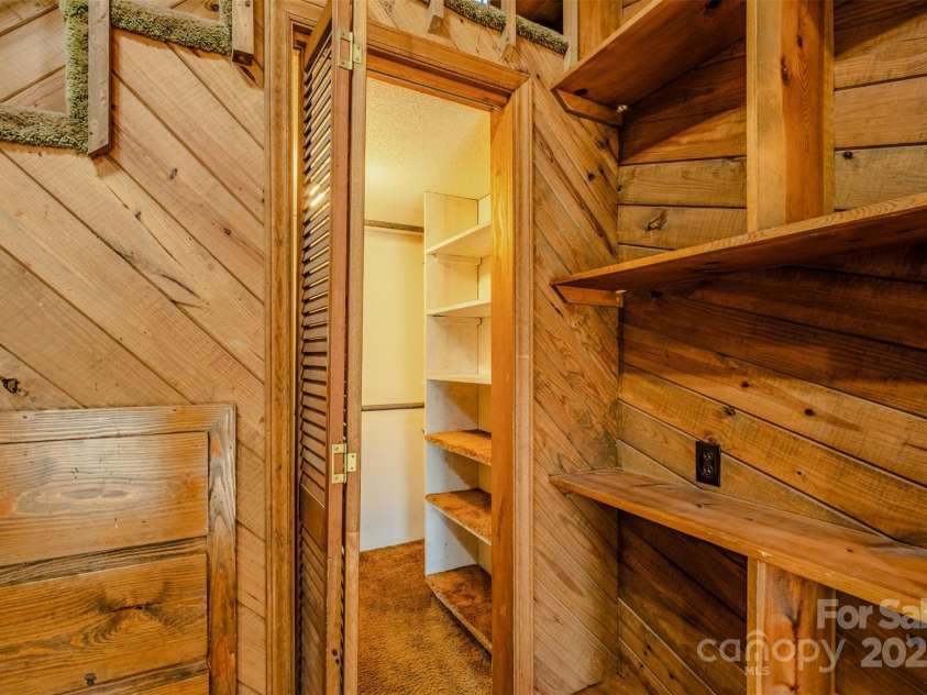 1215 Juniper Street, Salisbury, NC 28146.  MLS# CAR4329687, YatesRealty ID 8623. Walk-In Closet Tucked Below Bunk Platform