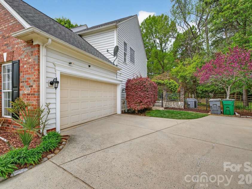 10804 Carmody Court, Charlotte, NC 28277.  MLS# CAR4360583, YatesRealty ID 8625. 2 Car Side Load Garage