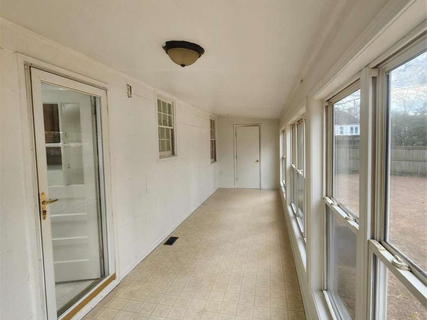 305 Louise Avenue, Rockingham, NC 28379.  MLS# CAR4231078, YatesRealty ID 8625. Glassed in porch