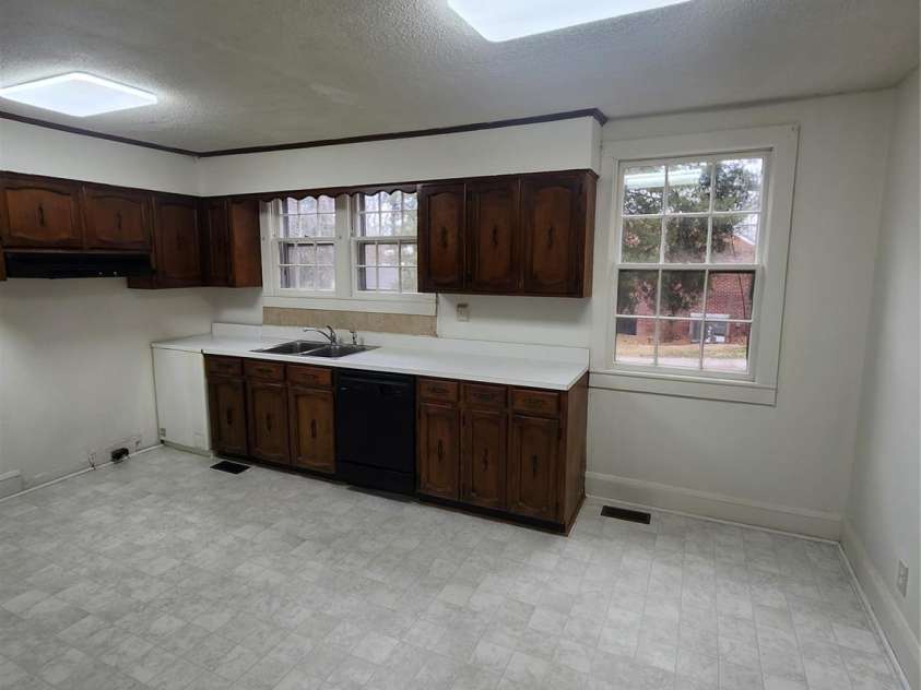 305 Louise Avenue, Rockingham, NC 28379.  MLS# CAR4231078, YatesRealty ID 8625. Kitchen/Dining