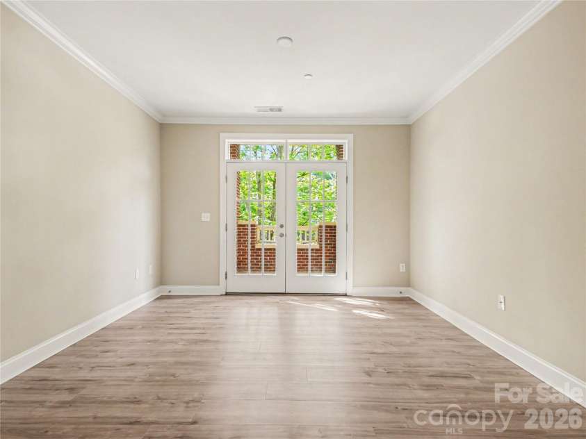 518 Clarice Avenue, Charlotte, NC 28204.  MLS# CAR4370259, YatesRealty ID 8627. Looking at the Living Room/Balcony from the front door.