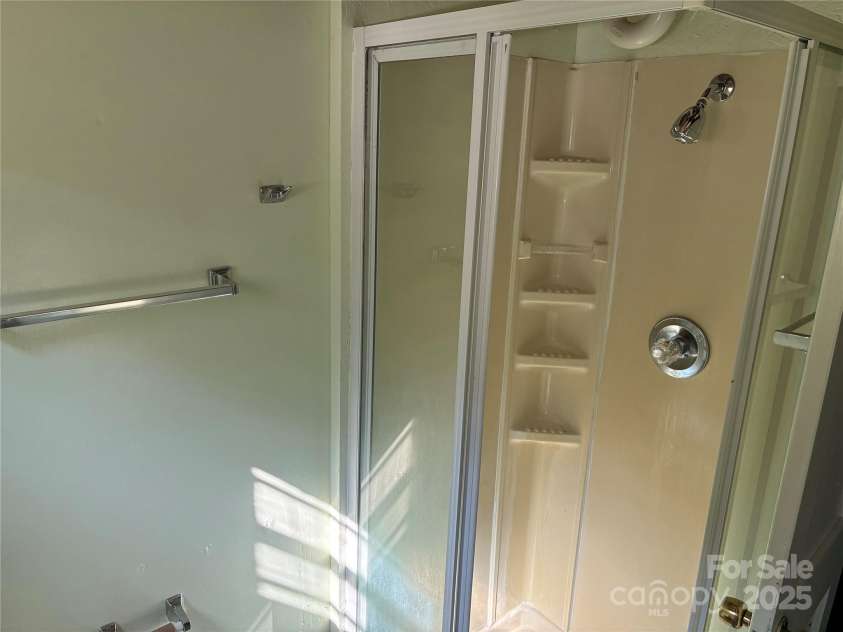 107 Mull Lane, Morganton, NC 28655.  MLS# CAR4225575, YatesRealty ID 8631. 3rd bathroom with shower in basement