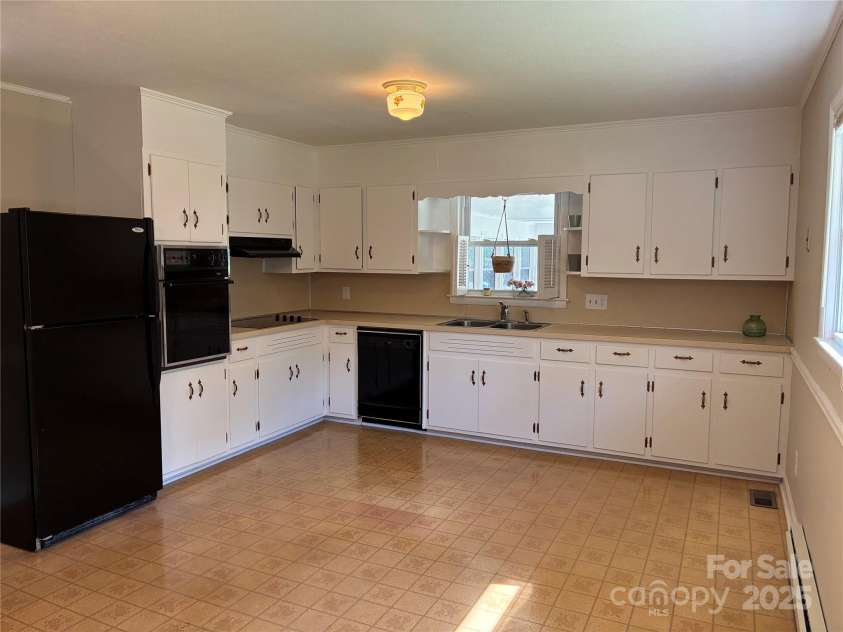 107 Mull Lane, Morganton, NC 28655.  MLS# CAR4225575, YatesRealty ID 8631. Kitchen with freshly painted cabinets