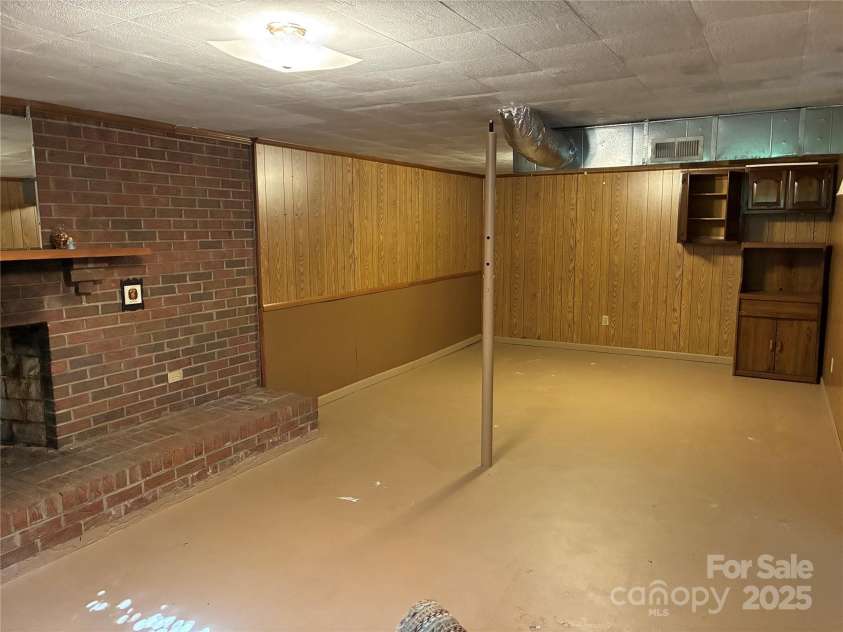 107 Mull Lane, Morganton, NC 28655.  MLS# CAR4225575, YatesRealty ID 8631. Right side of basement bonus room