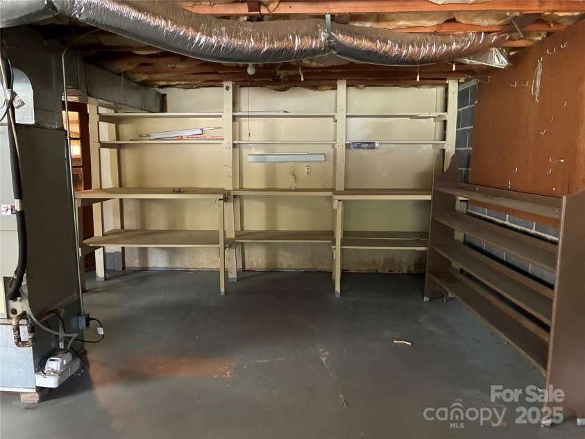 107 Mull Lane, Morganton, NC 28655.  MLS# CAR4225575, YatesRealty ID 8631. Workshop area in basement