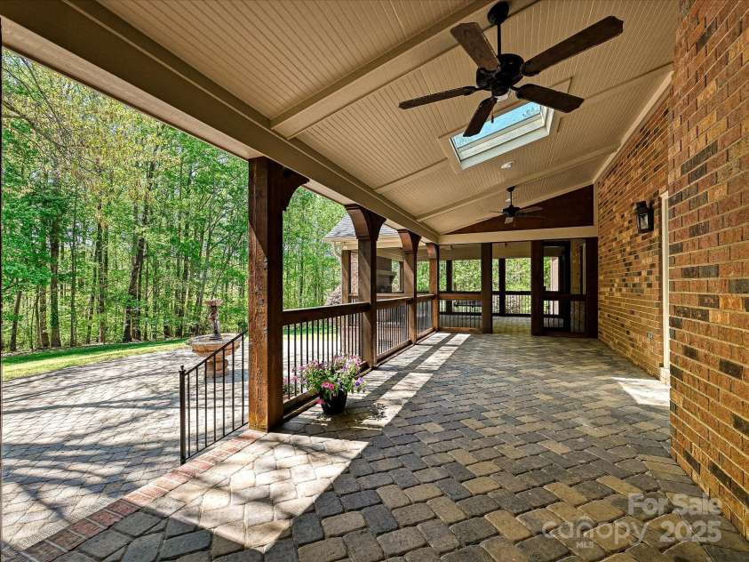 1413 Willow Oaks Trail, Weddington, NC 28104.  MLS# CAR4244521, YatesRealty ID 8632. Covered Lanai