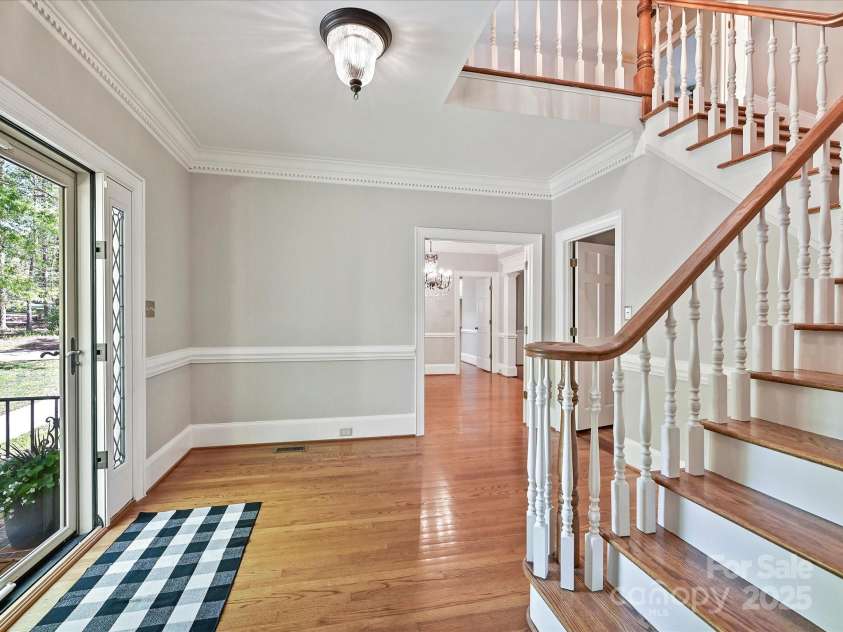 1413 Willow Oaks Trail, Weddington, NC 28104.  MLS# CAR4244521, YatesRealty ID 8632. Foyer to Dining Room