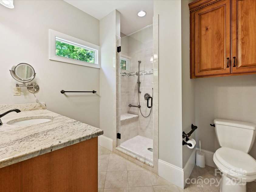 1413 Willow Oaks Trail, Weddington, NC 28104.  MLS# CAR4244521, YatesRealty ID 8632. Full bath in Guest suite/2nd Living qtrs. on main