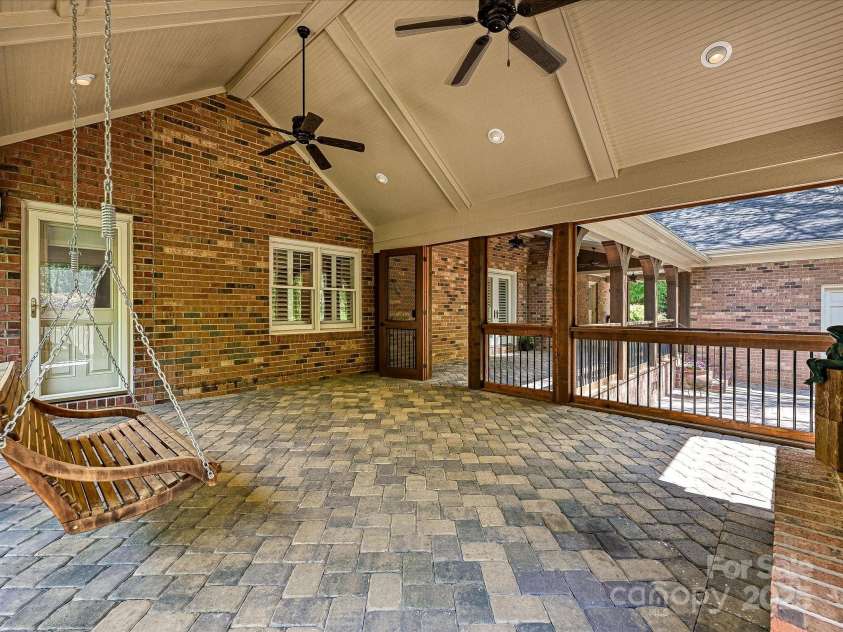 1413 Willow Oaks Trail, Weddington, NC 28104.  MLS# CAR4244521, YatesRealty ID 8632. Screen Porch swing, ceiling fans, recessed lighting