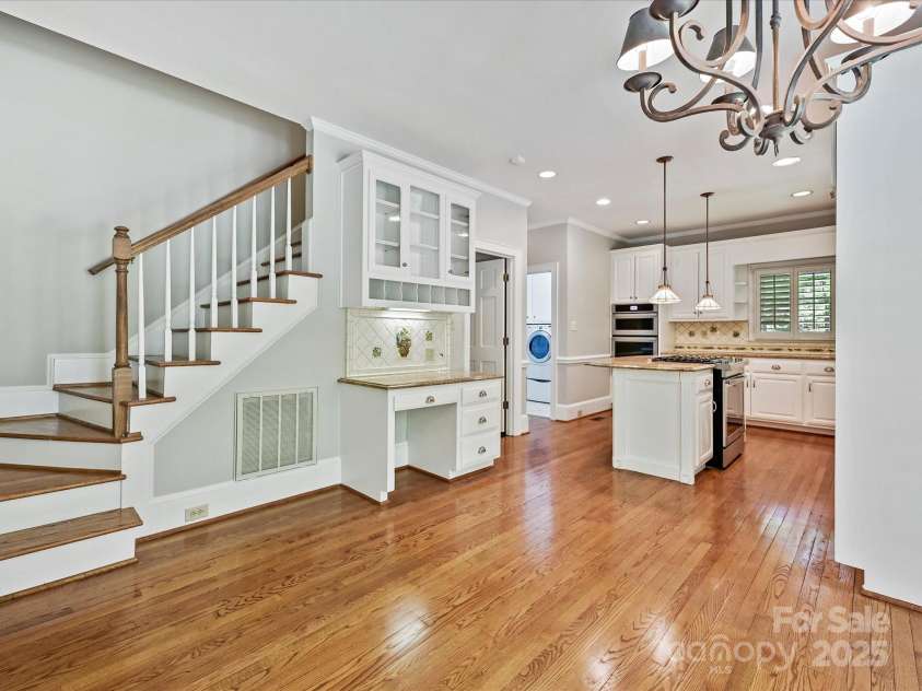 1413 Willow Oaks Trail, Weddington, NC 28104.  MLS# CAR4244521, YatesRealty ID 8632. Second set of stairs in kitchen