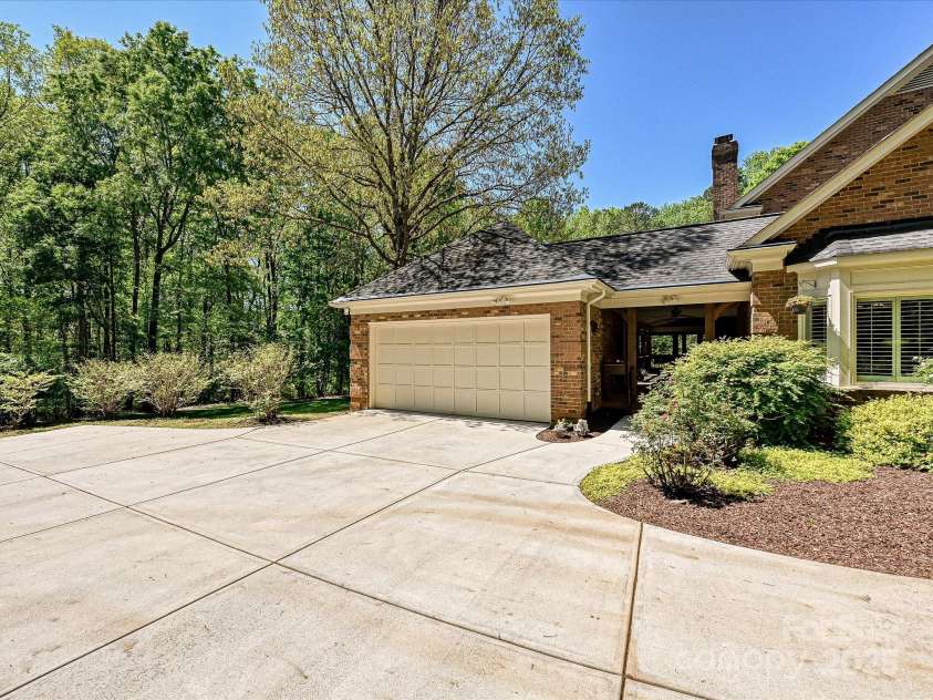 1413 Willow Oaks Trail, Weddington, NC 28104.  MLS# CAR4244521, YatesRealty ID 8632. Two car garage, large parking pad