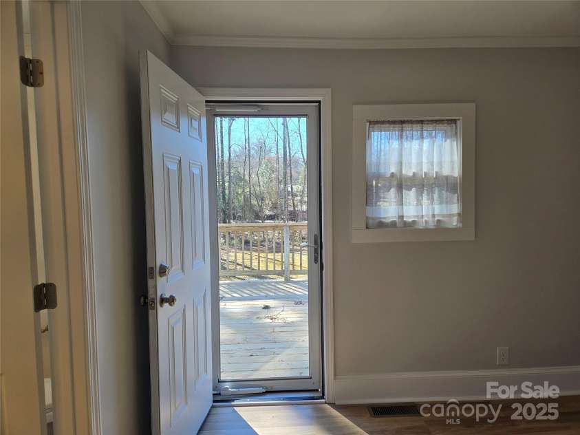 2222 19th Avenue, Hickory, NC 28601.  MLS# CAR4177695, YatesRealty ID 8637. Den - Leads out to large back deck