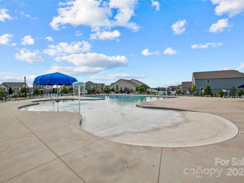123 Neill Estate Lane, Mooresville, NC 28117.  MLS# CAR4213802, YatesRealty ID 8642. Community Outdoor Pool w/ Splash Pad