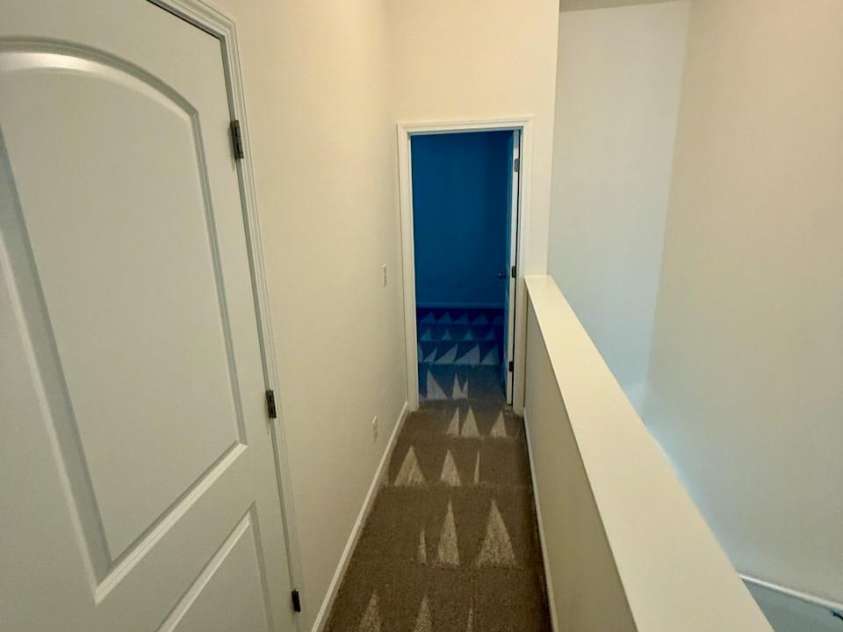 12716 Persimmon Tree Drive, Charlotte, NC 28273.  MLS# CAR4334571, YatesRealty ID 865. Upstairs Hallway