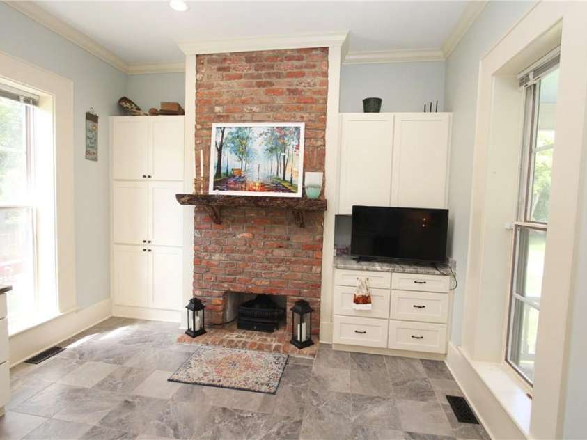 318 Camden Road, Wadesboro, NC 28170.  MLS# CAR3904497, YatesRealty ID 865. BREAKFAST AREA WITH GAS FIREPLACE INSERT AND PECAN MANTELPIECETHESE ARE ALL HANDMADE BRICKS!  FANTASTIC STORAGE - COUNT THE DRAWERS!
