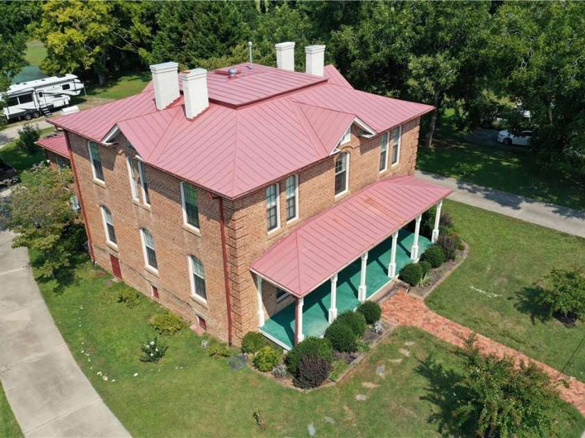 318 Camden Road, Wadesboro, NC 28170.  MLS# CAR3904497, YatesRealty ID 865. CONCRETE DRIVEWAY ALL AROUND THE HOUSE.  SPECIAL WATER TAP FOR OUTSIDE WATERING TO NOT INCLUDE THAT IN YOUR CITY SEPTIC BILL.