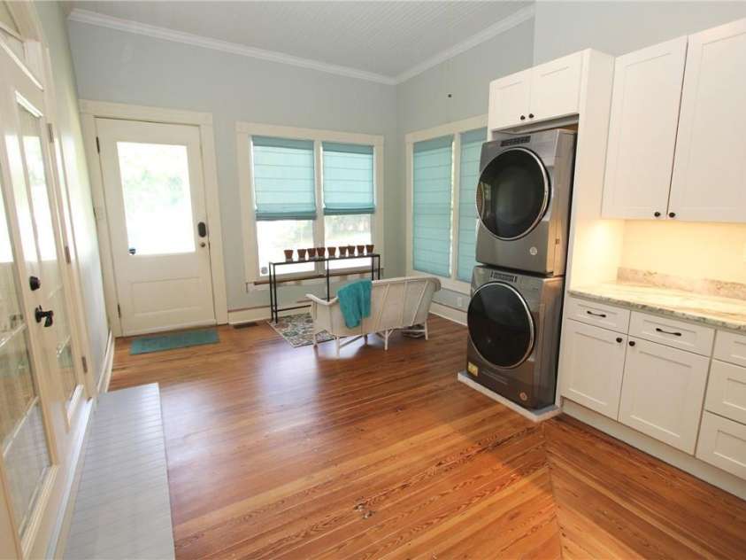 318 Camden Road, Wadesboro, NC 28170.  MLS# CAR3904497, YatesRealty ID 865. LARGE LAUNDRY WITH NEW CABINETS, BEAUTIFUL PLACE TO WORK.  THIS UTILITY ROOM IS PART SUNROOM.  BEAUTIFUL INSULATED PELLA WINDOWS THROUGH THIS ENTIRE HOUSE.