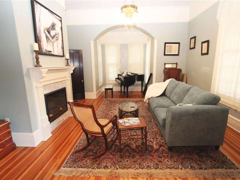 318 Camden Road, Wadesboro, NC 28170.  MLS# CAR3904497, YatesRealty ID 865. LIVING ROOM SO MANY HUGE WINDOWS THIS ALCOVE MAKES A BABY GRAND PIANO LOOK SMALL!