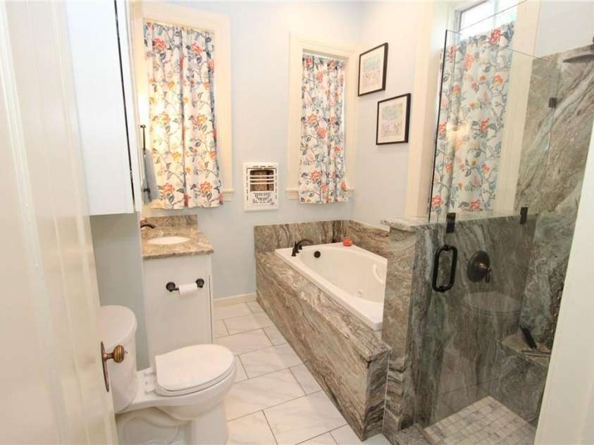 318 Camden Road, Wadesboro, NC 28170.  MLS# CAR3904497, YatesRealty ID 865. MAIN FLOOR BATH WITH JETTA WHIRLPOOL TUB WITH 3HP MOTOR & MOEN FIXTURES.  WALK-IN SHOWER with SEAT.