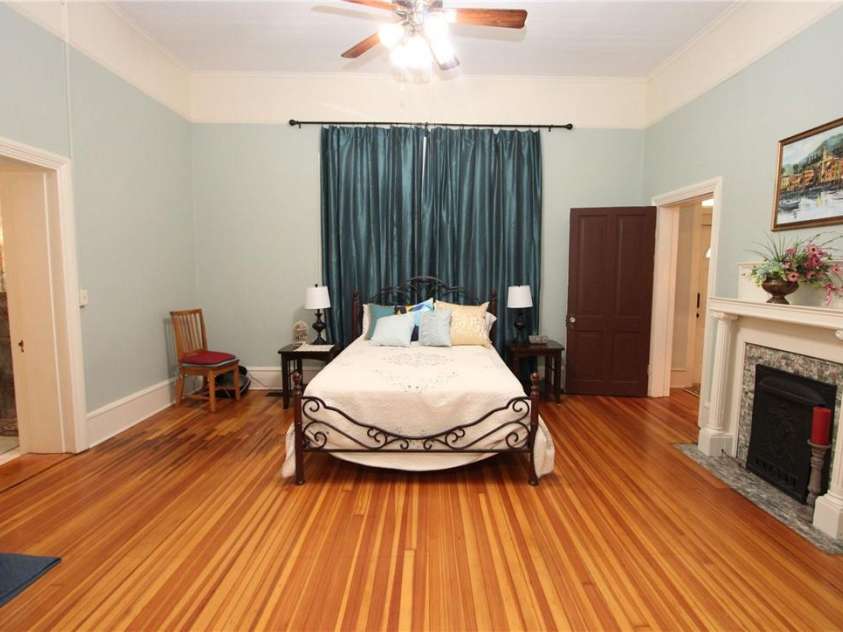 318 Camden Road, Wadesboro, NC 28170.  MLS# CAR3904497, YatesRealty ID 865. MAIN FLOOR BEDROOM, CLOSET ON RIGHT SIDE OF MANTLE