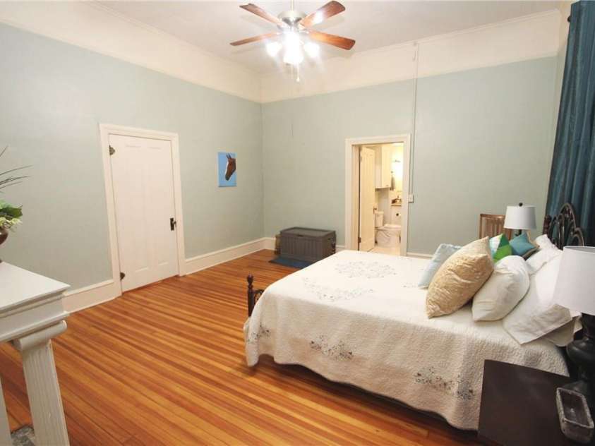 318 Camden Road, Wadesboro, NC 28170.  MLS# CAR3904497, YatesRealty ID 865. MAIN FLOOR BEDROOM WITH FIREPLACE ON THE LEFT.  CLOSED DOOR TO MAIN HALL & BATHROOM FOR THIS BEDROOM AHEAD.