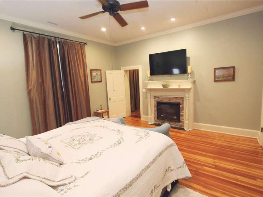 318 Camden Road, Wadesboro, NC 28170.  MLS# CAR3904497, YatesRealty ID 865. PRIMARY AND ALL BEDROOMS HAVE THE ELECTRIC INSERT IN THE FIREPLACE.  AS WELL AS HAVING CENTRAL HEAT AND AIR SYSTEM JUST FOR UPSTAIRS. CURTAINS & RODS REMAIN WITH THE WHOLE HOUSE.